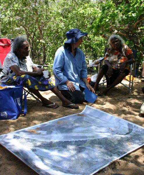Elders and rangers from Mapoon, Queensland, discussing their memories of the locations of the burial places of their family and ancestors (Source:
M.Sutton).